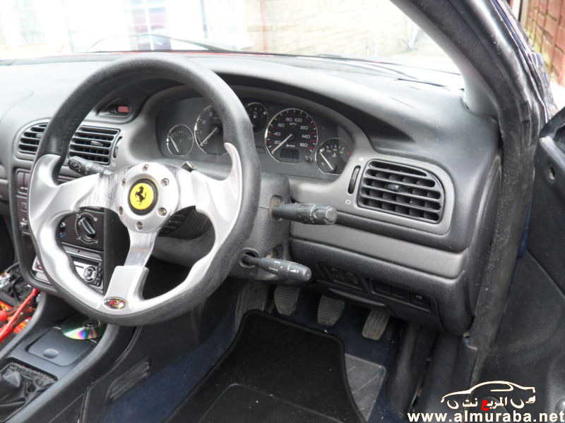 ايطالي يقوم بتحويل سيارته البيجو الى سيارة فيراري ويعرضها للبيع في اي باي بالصور Ferrari F430 32